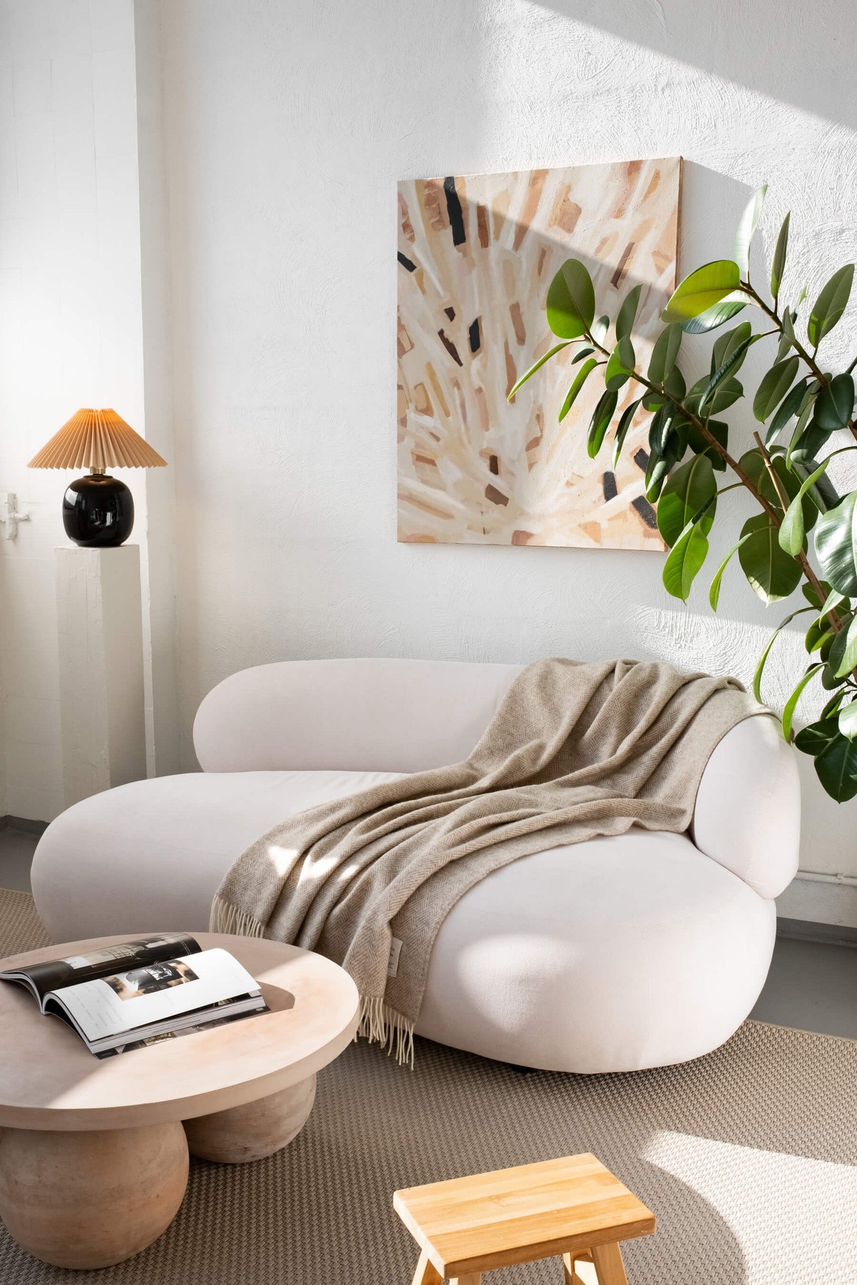 Hera wool throwHera pure wool throw blanket 130 x 170 cm on a white sofa